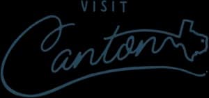 Black and white logo says visit Canton woth an image of Texas