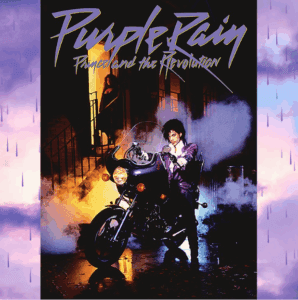 at the top of this poster says Purple Rain Prince and the revolution there is an image pf a person who resembles Prince on a Motorcycle