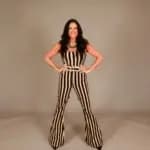Image of Sarah Evans in a beige and black jumpsuit