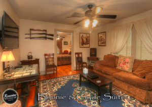 Bonnie & Clyde Themed Living Room with a Sofa, TV, Rug and Side Table