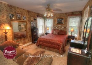 Hollywood Legends room with bed, love seat and dresser with mirror