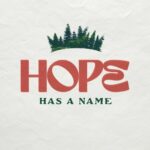 poster grove of christmas style trees at the tope then the word in large red letters HOPE-under that in smaller green letters -Has a Name