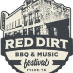 sepia toned sign with an old building in the background in the middle are the words Red Dirt under that BBQ and Music under that festival Tyler, Tx