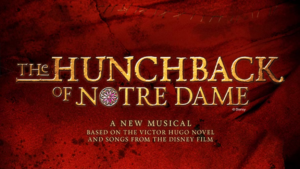Rectangular sign with a rust background words in yellow say The Hunchback of Notre Dame A new musical