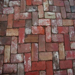 red bricks in a herringbone pattern