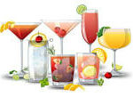 various size and shapes of glasses filled with various colors of drink and all include some kind of fruit garnish.