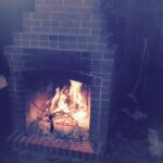 fire aglow in the courtyard