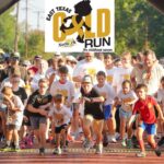 Runners of all different ages at the top in the middle says East Texas Gold Run 