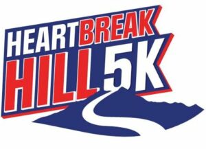 logo in red,white and blue that says Heartbreak Hill 5K 