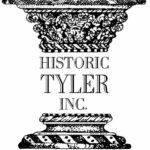 black divided ornate column on a white background with the words in the middle HISTORIC TYLER INC-it is the logo