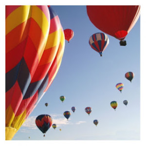 hot air balloons in flight-blue sky