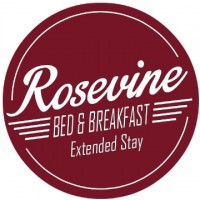 Rosevine Inn Logo a Burgandy circle wthe white letters ways Rosevine Bed and Breakfast extended stay